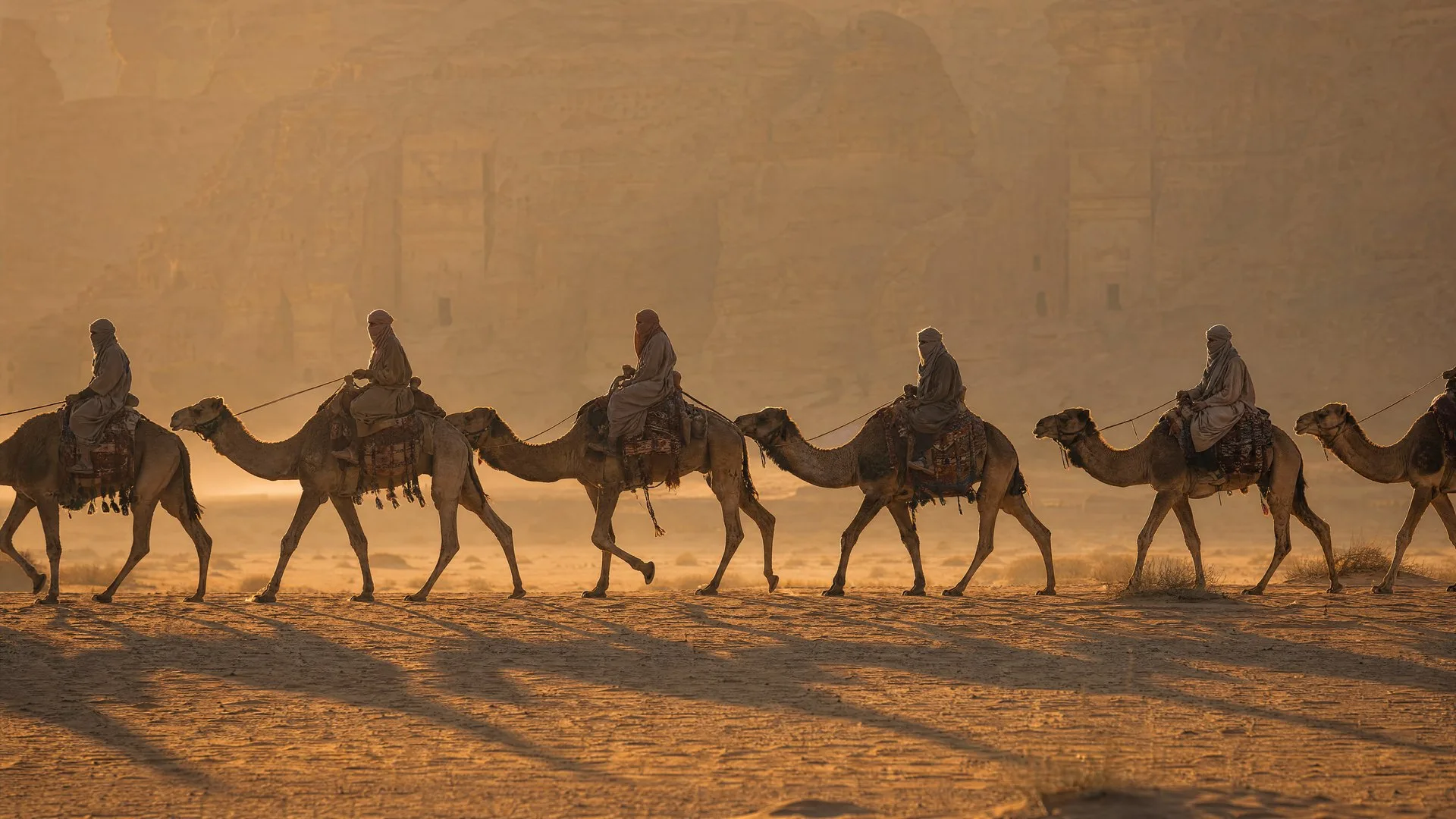 Camel caravan crossing the desert at Hegra